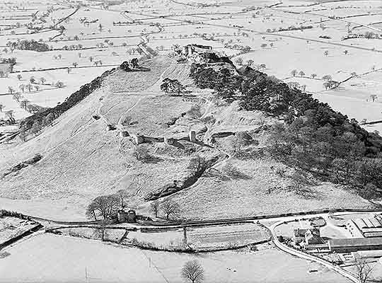Aerial photograph of Beeston in the 1950s, showing the outer ward and curtain wall before the site was covered with trees and bushes Aerial photograph of Beeston in the 1950s, showing the outer ward and curtain wall before the site was covered with trees and bushes